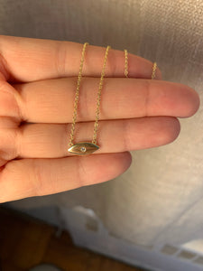 Gold eye necklace with CZ stone