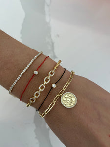 String bracelets with bezel stone