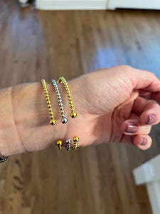Assorted open-ended adjustable bangles